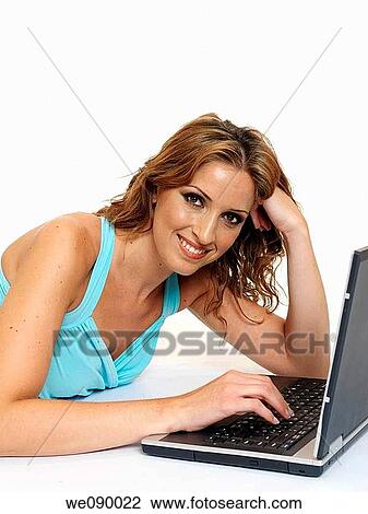 Stock Image - Woman with portable. Fotosearch