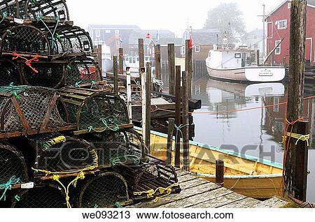 Wood lobster traps on dock and boats in fog at Fishermans Cove Eastern Passage Halifax Nova Scotia View Large Photo Image Stock Image - Wood lobster traps on dock and boats in fog at Fishermans Cove Eastern Passage Halifax Nova Scotia. Fotosearch
