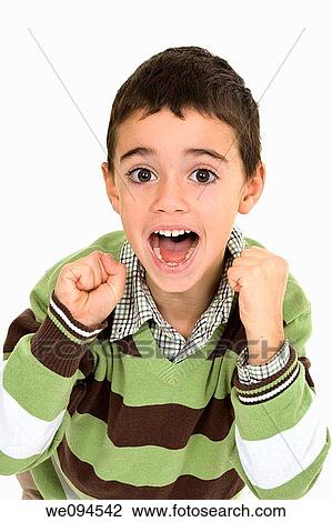 Young angry caucasian boy dressed in a casual outfit and standing on a white background View Large Photo Image Stock Image - Young angry caucasian boy dressed in a casual outfit and standing on a white background. Fotosearch
