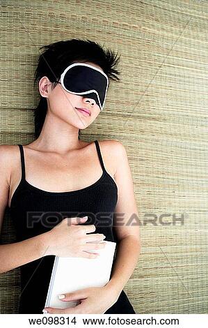 Young asian woman relaxing View Large Photo Image Picture - Young asian woman relaxing. Fotosearch