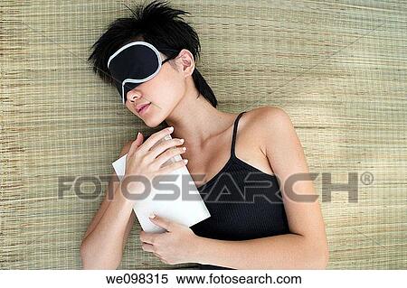 Young asian woman relaxing View Large Photo Image Stock Photography - Young asian woman relaxing. Fotosearch