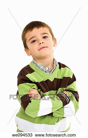 Young caucasian boy dressed in a casual outfit and standing on a white background View Large Photo Image Stock Image - Young caucasian boy dressed in a casual outfit and standing on a white background. Fotosearch