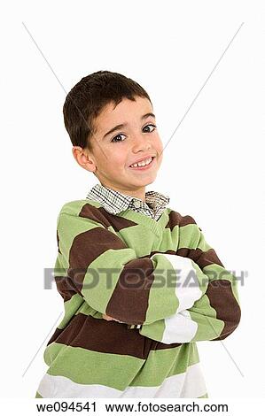 Young caucasian boy dressed in a casual outfit and standing on a white background View Large Photo Image Stock Image - Young caucasian boy dressed in a casual outfit and standing on a white background. Fotosearch