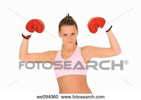 Young Caucasian woman in red boxing gloves showing a sign of victory View Large Photo Image Stock Image - Young Caucasian woman in red boxing gloves showing a sign of victory. Fotosearch