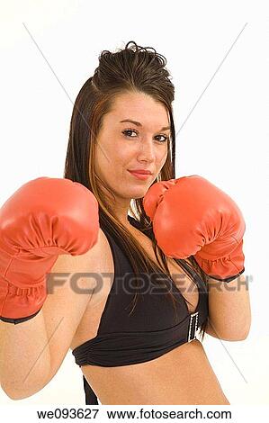 Young caucasian woman in swinsuit with boxing gloves She is standing on a white background View Large Photo Image Stock Photo - Young caucasian woman in swinsuit with boxing gloves She is standing on a white background. Fotosearch