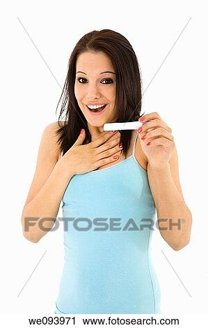 Young Caucasian woman looking at pregnancy test View Large Photo Image Stock Image - Young Caucasian woman looking at pregnancy test. Fotosearch