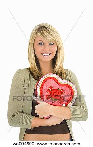 Young Caucasian woman very excited after recieving a special gift View Large Photo Image Stock Image - Young Caucasian woman very excited after recieving a special gift. Fotosearch