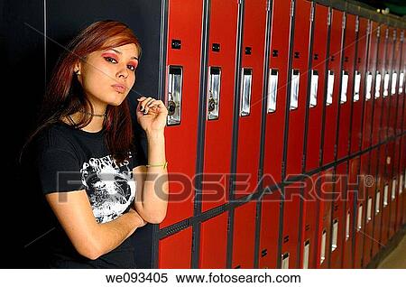 Young female metal punk rocker student in a basement school locker room View Large Photo Image Stock Photography - Young female metal punk rocker student in a basement school locker room. Fotosearch