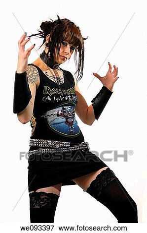 Young heavy metal female punk with horns piercings and tattoos on a white background View Large Photo Image Stock Photo - Young heavy metal female punk with horns piercings and tattoos on a white background. Fotosearch