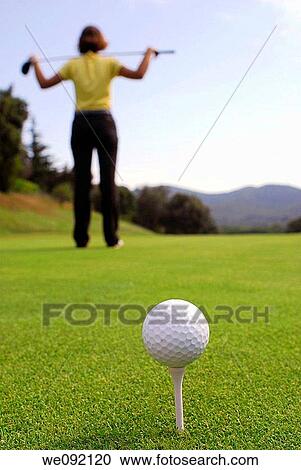 Young woman golfer observing terrain and conditions before hitting View Large Photo Image Stock Image - Young woman golfer observing terrain and conditions before hitting. Fotosearch