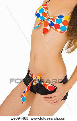 young woman posing in a bikini on white background View Large Photo Image Stock Photography - young woman posing in a bikini on white background. Fotosearch