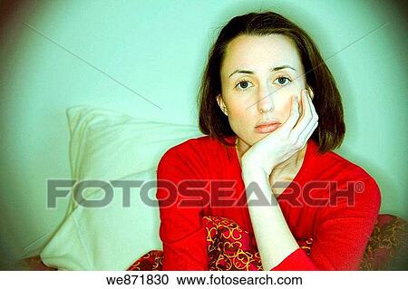 Young woman posing in her bed. View Large Photo Image Stock Image - Young woman posing in her bed.. Fotosearch