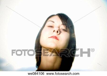 Young woman posing View Large Photo Image Stock Photograph - Young woman posing. Fotosearch