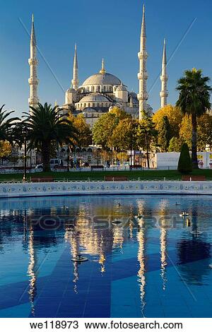 Blue Mosque in early morning sun with reflection in pool Istanbul Turkey View Large Photo Image Stock Image - Blue Mosque in early morning sun with reflection in pool Istanbul Turkey. Fotosearch