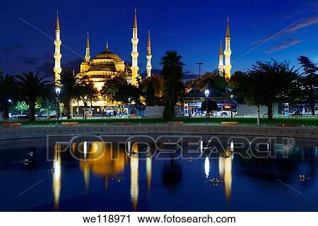 Blue Mosque lit at dusk with reflection in fountain Istanbul Turkey View Large Photo Image Stock Image - Blue Mosque lit at dusk with reflection in fountain Istanbul Turkey. Fotosearch