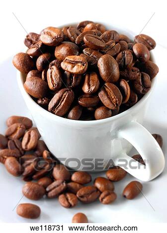 Coffee beans in a coffee cup Stock Photo View Large Photo Image Stock Image - Coffee beans in a coffee cup Stock Photo. Fotosearch