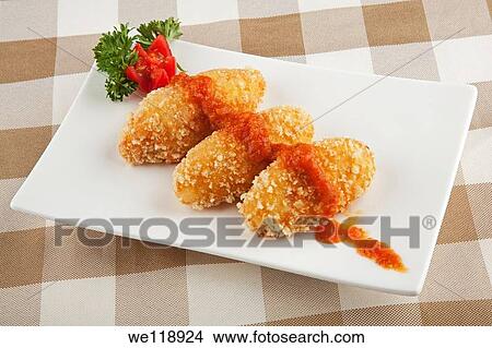 Delicious Cheese Sticks covered with Mozzarella Sauce View Large Photo Image Picture - Delicious Cheese Sticks covered with Mozzarella Sauce. Fotosearch