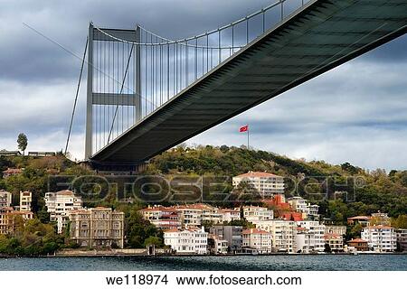 Fatih Sultan Mehmet Bridge over mansions on the Bosphorus Strait at Rumeli Hisari Istanbul Turkey View Large Photo Image Picture - Fatih Sultan Mehmet Bridge over mansions on the Bosphorus Strait at Rumeli Hisari Istanbul Turkey. Fotosearch