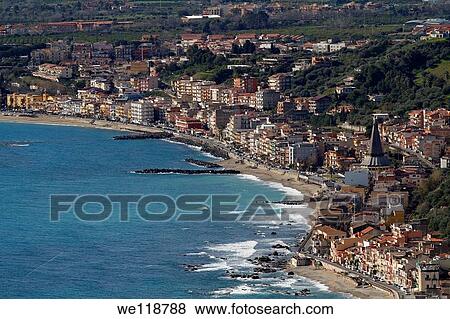 Stock Photo - Giardini Naxos viewed from Taormina, Sicily, Italy. Fotosearch