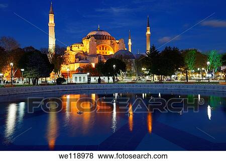 Lights on Hagia Sophia at twilight with reflections in fountain Istanbul Turkey View Large Photo Image Stock Photo - Lights on Hagia Sophia at twilight with reflections in fountain Istanbul Turkey. Fotosearch