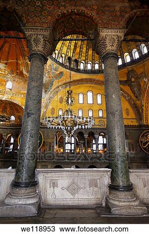 Stock Image - Marble pillars on upper level of the Hagia Sophia Istanbul with domes and Saraphim. Fotosearch