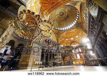 Morning light in an empty Hagia Sophia with chandeliers and golden dome View Large Photo Image Stock Image - Morning light in an empty Hagia Sophia with chandeliers and golden dome. Fotosearch