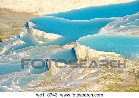 Photo & Image of Pamukkale Travetine Terrace, Turkey Picture of the white Calcium carbonate rock formations View Large Photo Image Stock Image - Photo & Image of Pamukkale Travetine Terrace, Turkey Picture of the white Calcium carbonate rock formations. Fotosearch