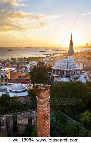 Setting sun behind the Sokollu Mehmet Pasha mosque minaret and historic Dervish ruins on the Marmara Sea Istanbul View Large Photo Image Picture - Setting sun behind the Sokollu Mehmet Pasha mosque minaret and historic Dervish ruins on the Marmara Sea Istanbul. Fotosearch
