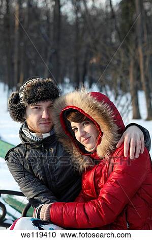 Couple spending a day in a snowy park in Bucharest, Romania View Large Photo Image Stock Image - Couple spending a day in a snowy park in Bucharest, Romania. Fotosearch