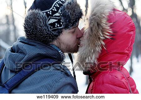 Couple spending a day in a snowy park in Bucharest, Romania View Large Photo Image Stock Photo - Couple spending a day in a snowy park in Bucharest, Romania. Fotosearch