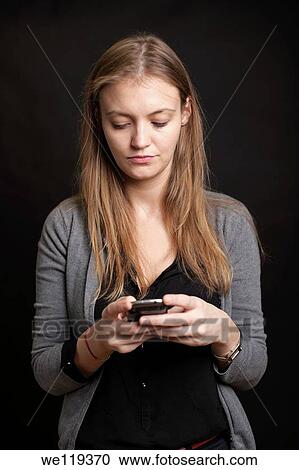 Girl texting View Large Photo Image Stock Image - Girl texting. Fotosearch