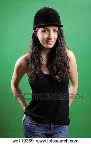 Stock Photo - Girl wearing jockey hat. Fotosearch
