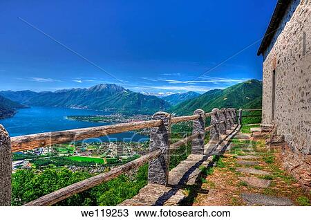 Panoramic view over an alpine lake with mountain View Large Photo Image Stock Image - Panoramic view over an alpine lake with mountain. Fotosearch
