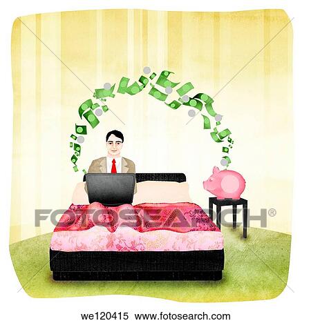 Stock Photography - Businessman working on a laptop on the bed and money moving into piggy bank. Fotosearch