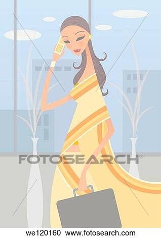 Stock Image - Businesswoman talking on a mobile phone. Fotosearch