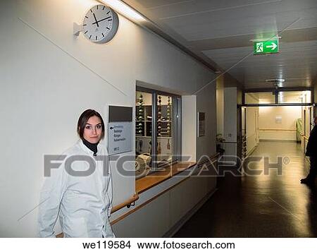 Female doctor on a night shift at hospital View Large Photo Image Picture - Female doctor on a night shift at hospital. Fotosearch