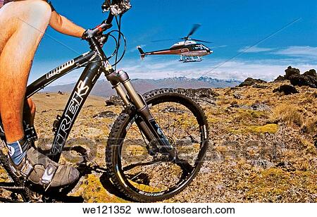 Stock Image - Heli-mountain biking Central Otago South Island New Zealand. Fotosearch