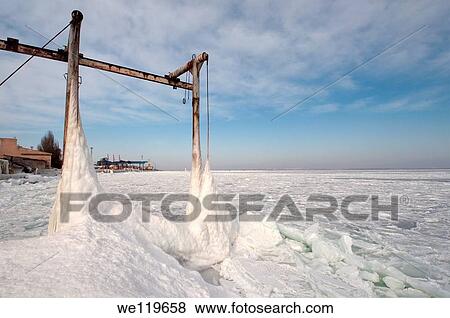 Icy pier, frozen Black Sea, a rare phenomenon, last time it occured in 1977, Odessa, Ukraine, Eastern Europe View Large Photo Image Stock Photo - Icy pier, frozen Black Sea, a rare phenomenon, last time it occured in 1977, Odessa, Ukraine, Eastern Europe. Fotosearch