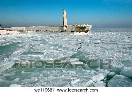 Icy pier, frozen Black Sea, a rare phenomenon, last time it occured in 1977, Odessa, Ukraine, Eastern Europe View Large Photo Image Stock Photo - Icy pier, frozen Black Sea, a rare phenomenon, last time it occured in 1977, Odessa, Ukraine, Eastern Europe. Fotosearch