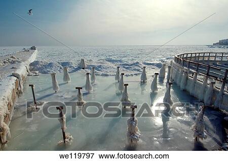 Icy pier, frozen Black Sea, a rare phenomenon, last time it occured in 1977, Odessa, Ukraine, Eastern Europe View Large Photo Image Stock Photo - Icy pier, frozen Black Sea, a rare phenomenon, last time it occured in 1977, Odessa, Ukraine, Eastern Europe. Fotosearch