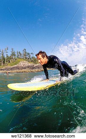Male surfer, aged 25-30 Tofino British Columbia Canada View Large Photo Image Stock Photo - Male surfer, aged 25-30 Tofino British Columbia Canada. Fotosearch