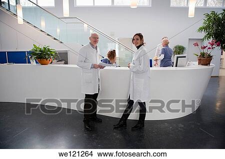 Modern hospital reception View Large Photo Image Picture - Modern hospital reception. Fotosearch