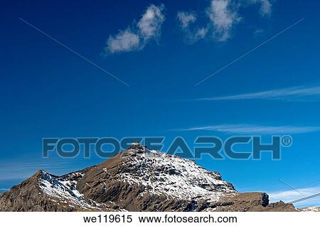Top of the Schilthorn with the revolving restaurant Piz Gloria, Berner Alpen, Switzerland View Large Photo Image Stock Photography - Top of the Schilthorn with the revolving restaurant Piz Gloria, Berner Alpen, Switzerland. Fotosearch