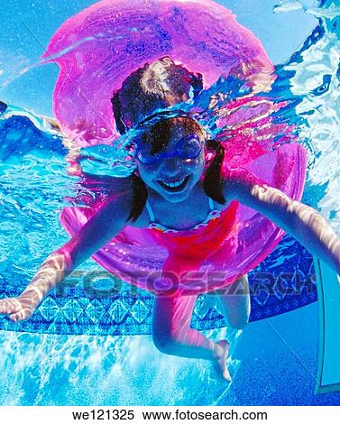 Underwater photograph of children, aged 5 and 7 years old, playing in swimming pool View Large Photo Image Stock Photography - Underwater photograph of children, aged 5 and 7 years old, playing in swimming pool. Fotosearch