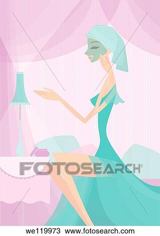 Stock Image - Woman with facial mask on her face. Fotosearch