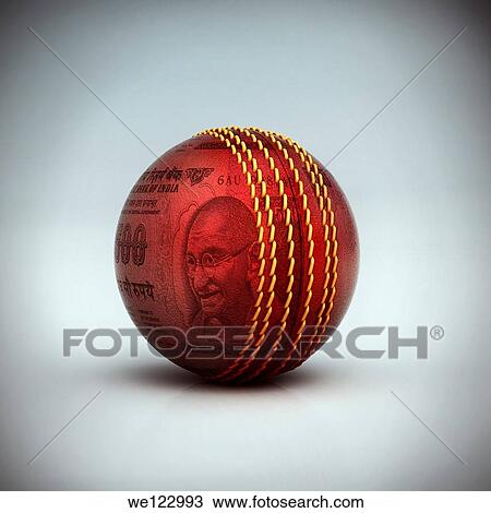 Stock Image - A cricket ball with Indian currency. Fotosearch