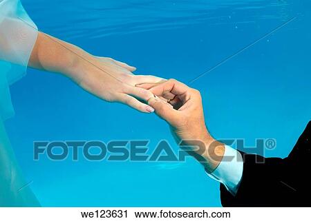 Bridal couple, underwater wedding in pool View Large Photo Image Stock Image - Bridal couple, underwater wedding in pool. Fotosearch