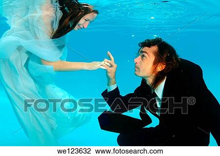 Bridal couple, underwater wedding in pool View Large Photo Image Stock Image - Bridal couple, underwater wedding in pool. Fotosearch
