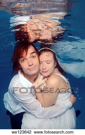 Bridal couple, underwater wedding in pool View Large Photo Image Stock Image - Bridal couple, underwater wedding in pool. Fotosearch