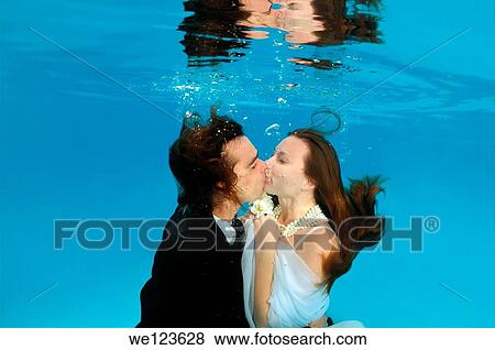 Bridal couple, underwater wedding in pool View Large Photo Image Stock Photo - Bridal couple, underwater wedding in pool. Fotosearch